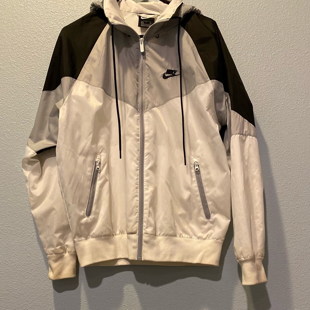 Nike Windbreaker with detachable hood.